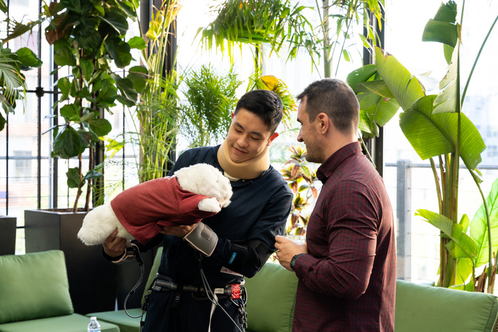 Wu explaining PARO’s features to a guest