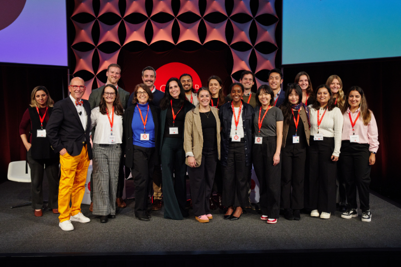Research staff from the AgeLab pose on stage at the Forum's conclusion