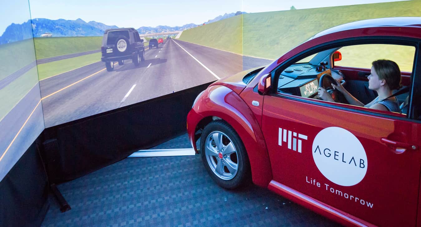 Woman drives MIT AgeLab car in driving simulator 